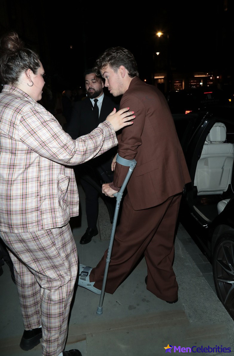 Will Poulter with crutches