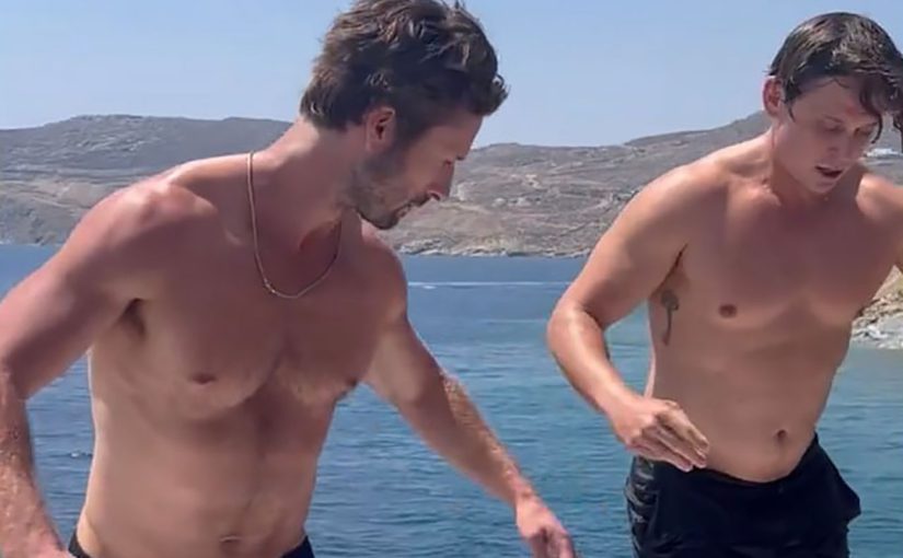 Glen Powell & Billy Magnussen have fun on the boat