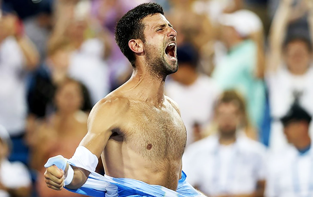 Novak Djokovic flaunts his bare torso after winning tournament