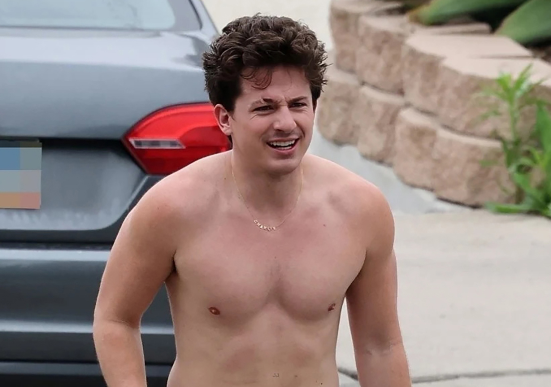 Charlie Puth shows off his naked torso while running