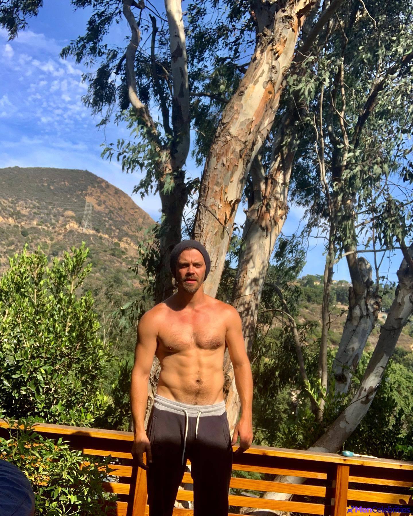 Tom Payne shirtless