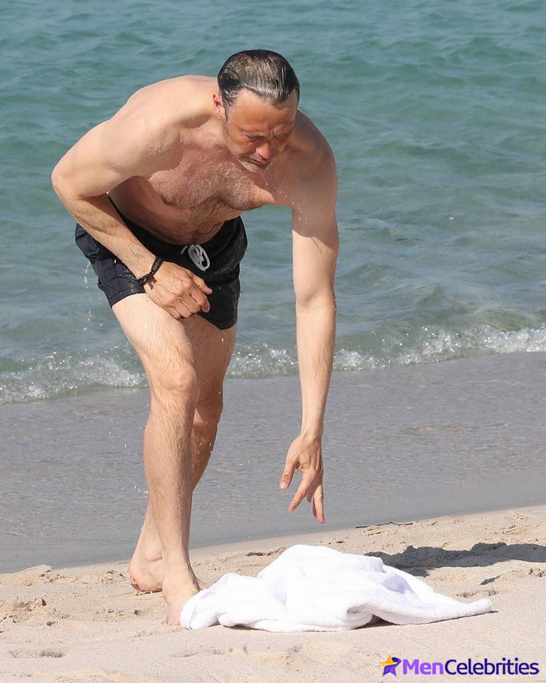 Mads Mikkelsen on beach