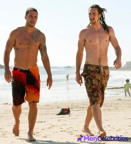 Taylor Kitsch shirtless on beach