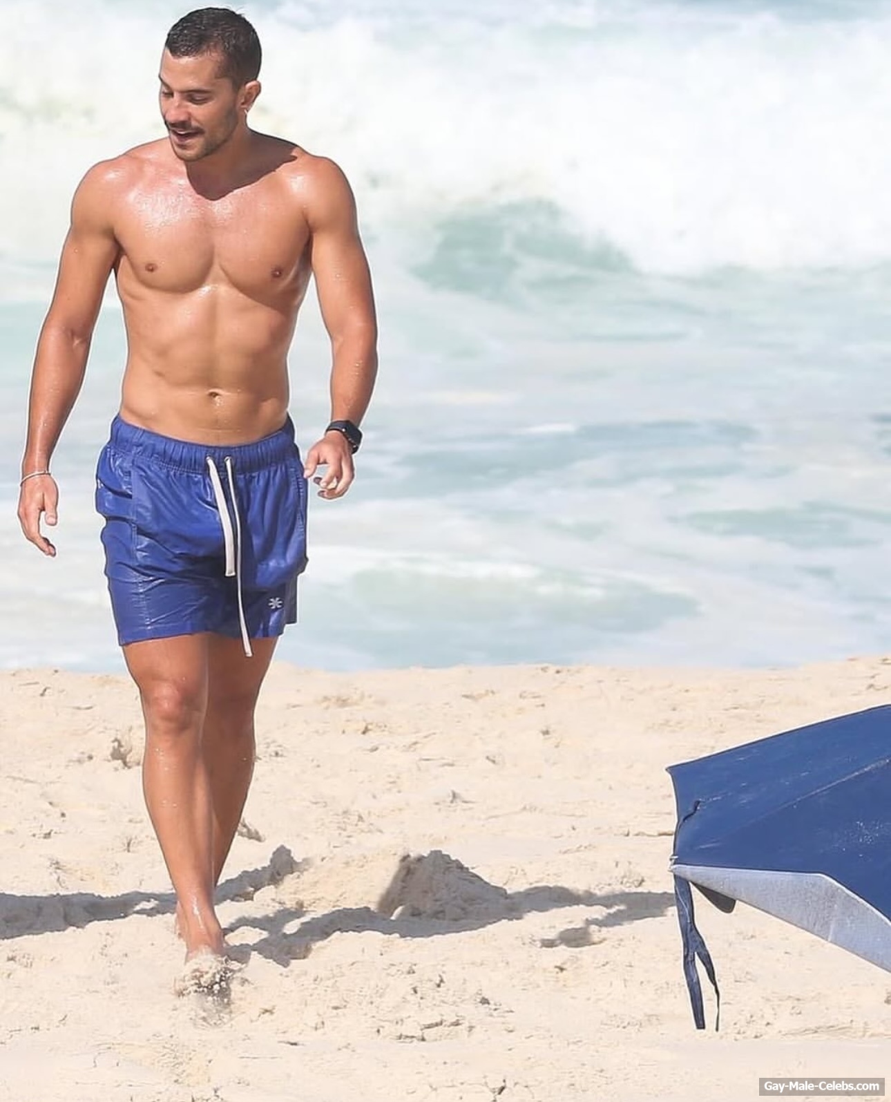 Andre Lamoglia on a beach