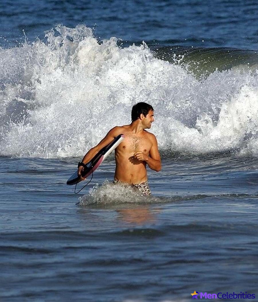Stuart Townsend on a beach