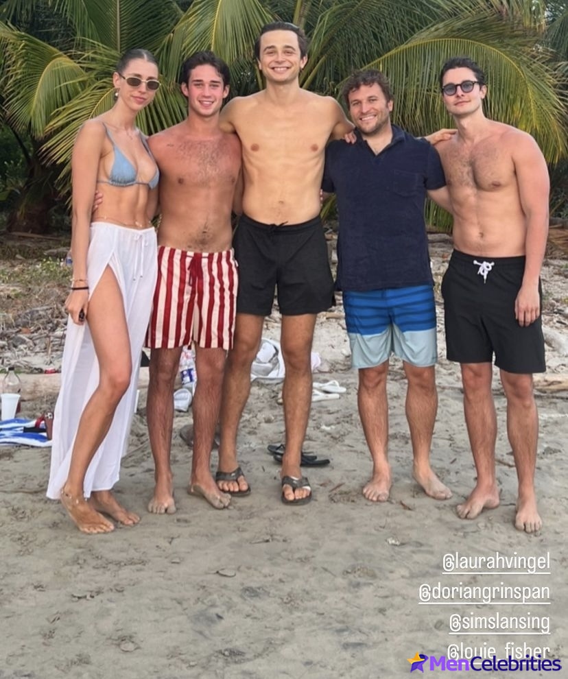 Ben Ahlers on a beach