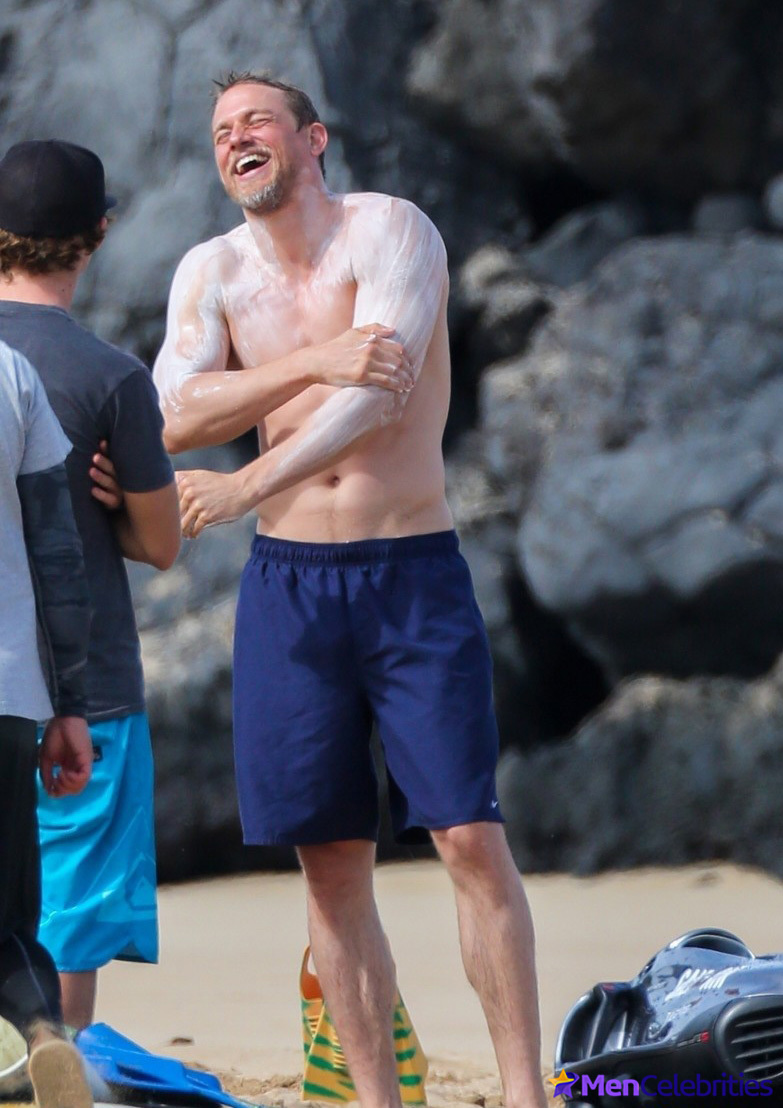 Charlie Hunnam sunbathing