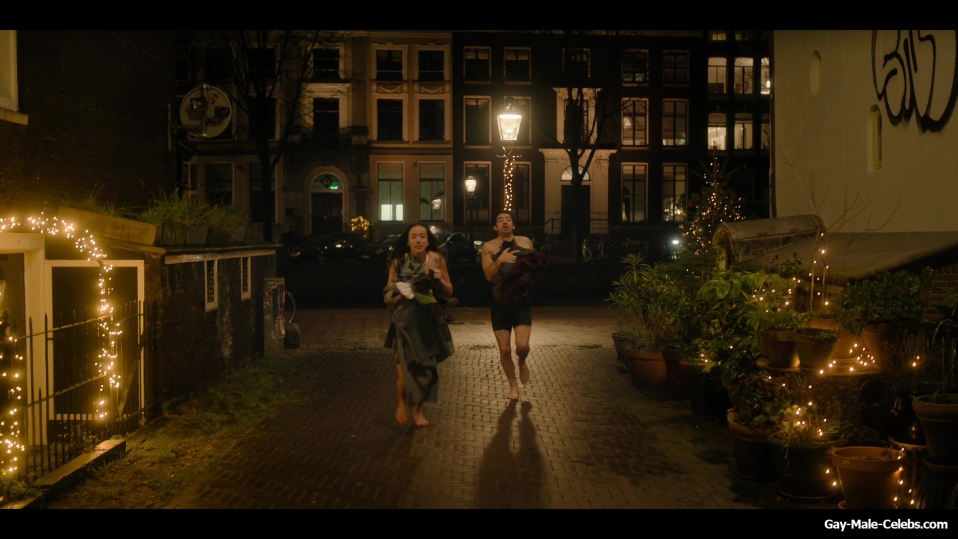 Joe Jonas shirtless in A Very Jonas Christmas Movie