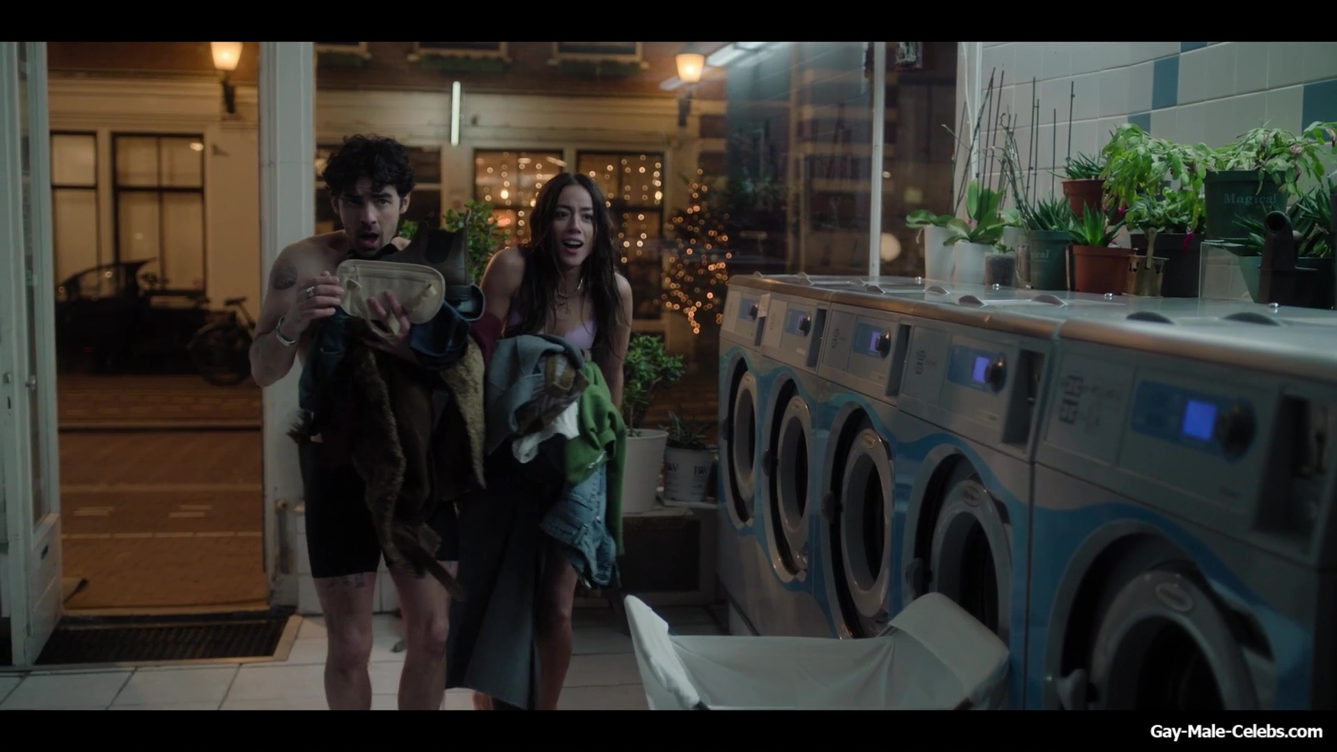 Joe Jonas shirtless in A Very Jonas Christmas Movie