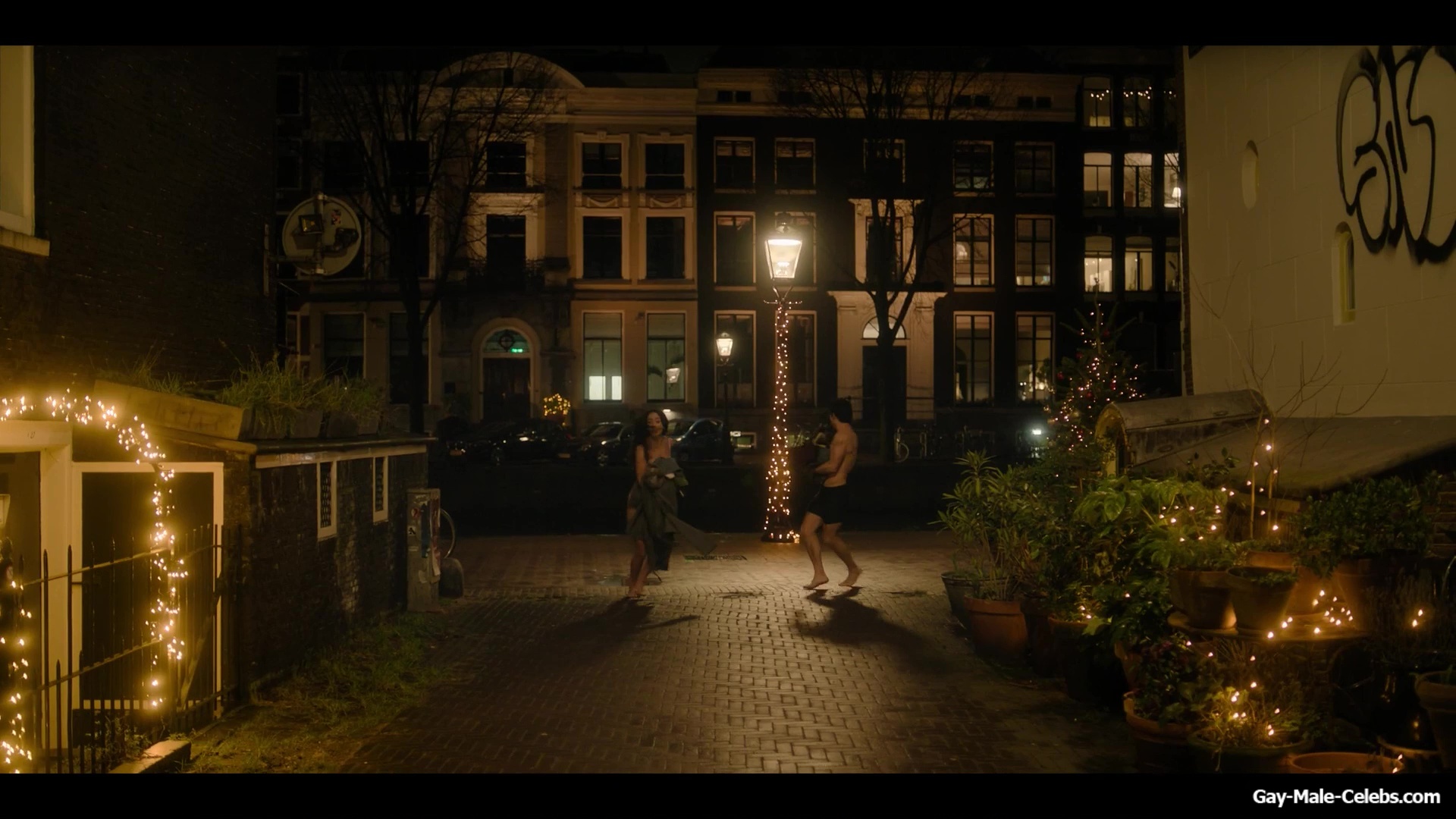 Joe Jonas shirtless in A Very Jonas Christmas Movie