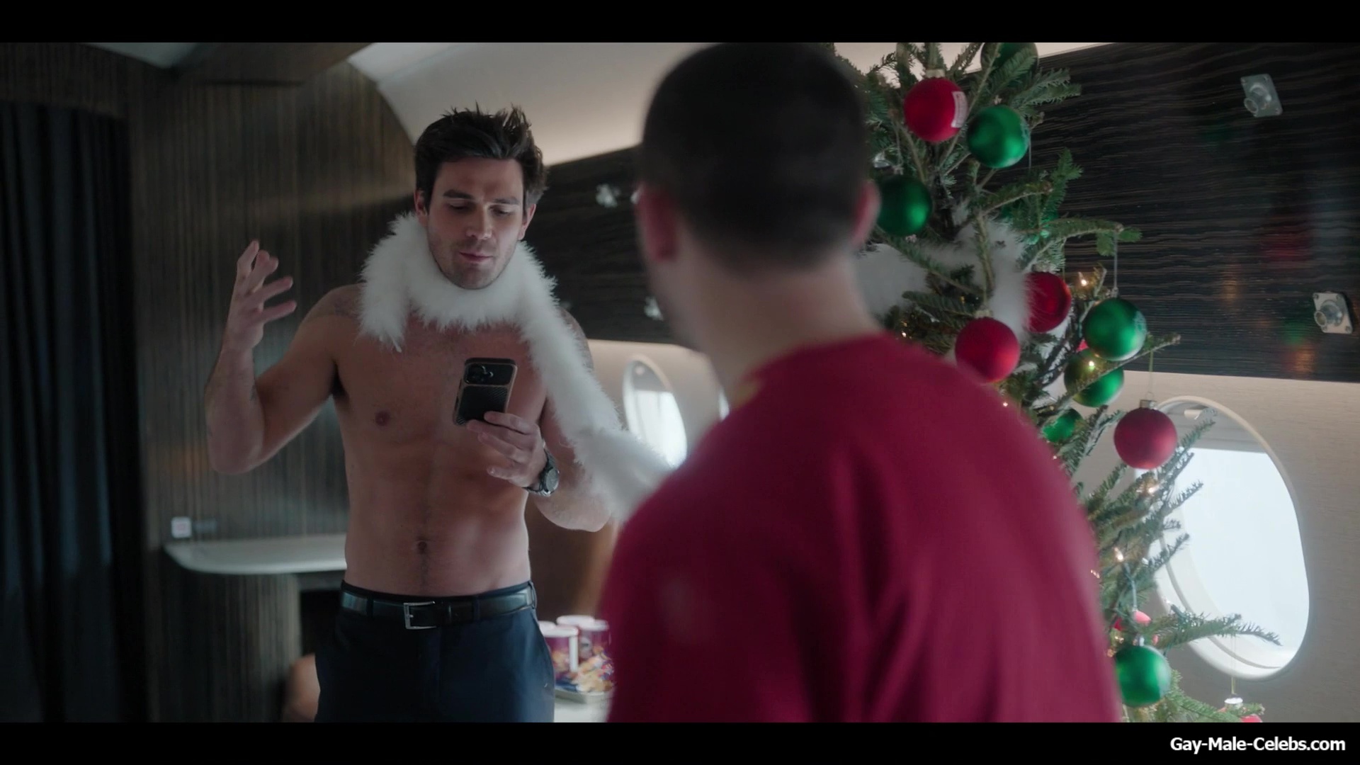KJ Apa shirtless in A Very Jonas Christmas Movie