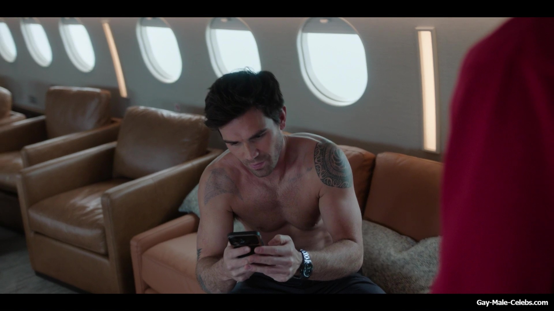 KJ Apa shirtless in A Very Jonas Christmas Movie