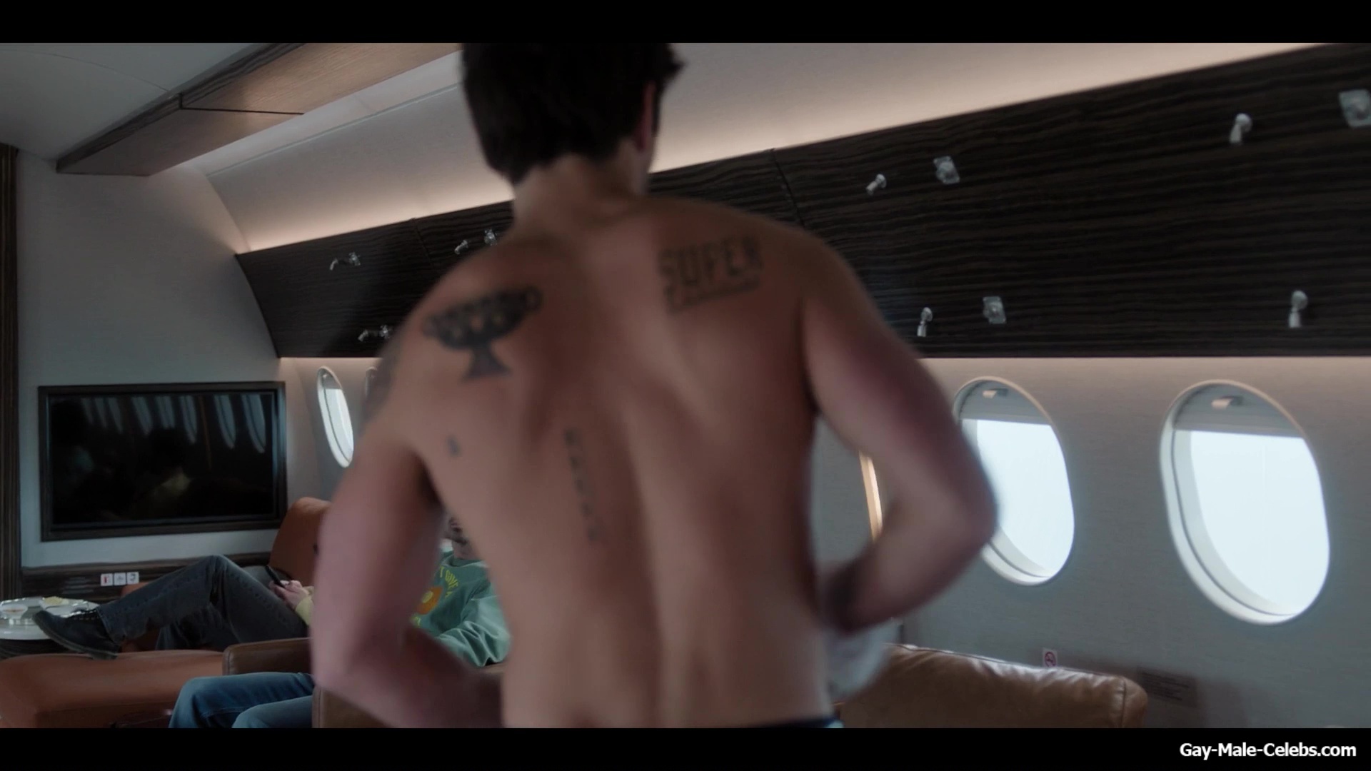 KJ Apa shirtless in A Very Jonas Christmas Movie