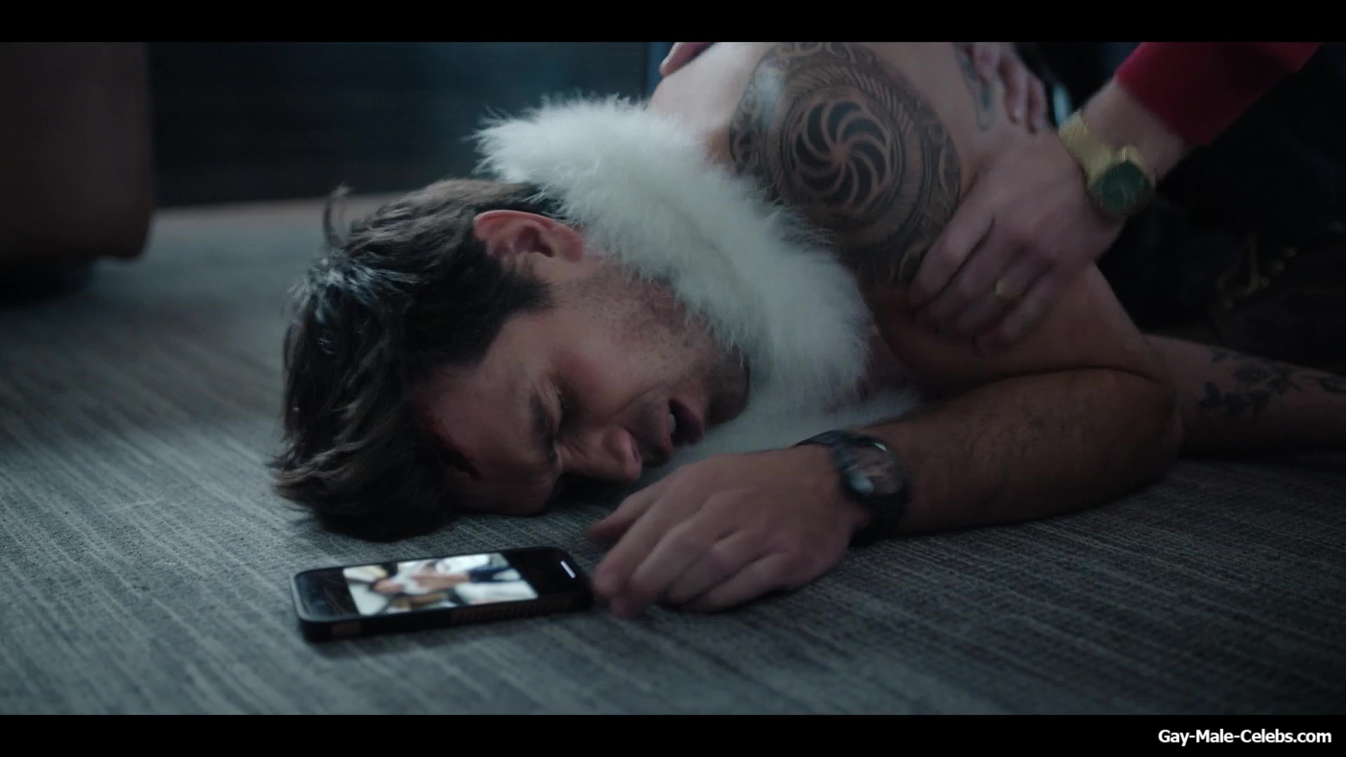 KJ Apa shirtless in A Very Jonas Christmas Movie