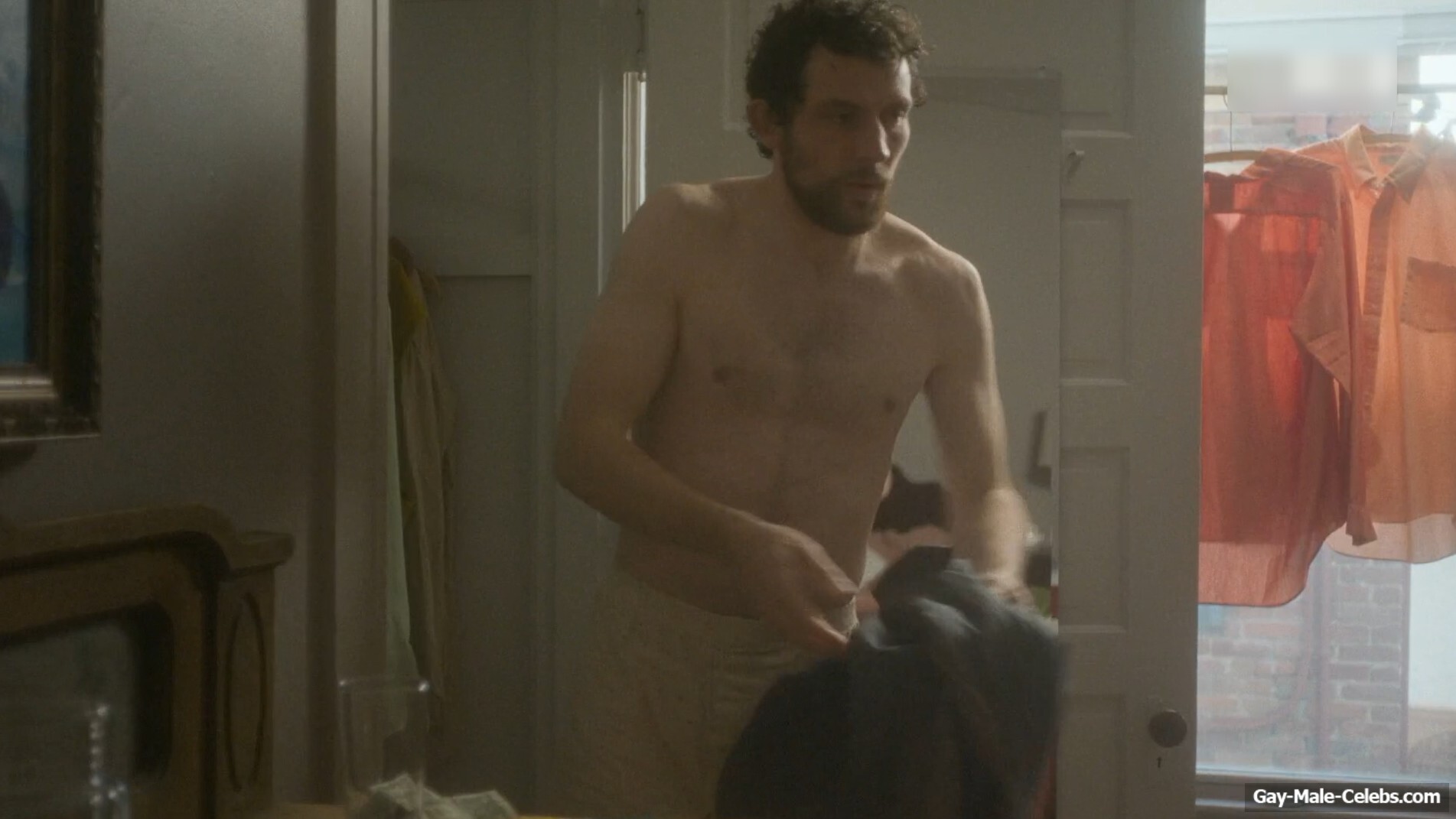 Josh O'Connor shirtless in The Mastermind