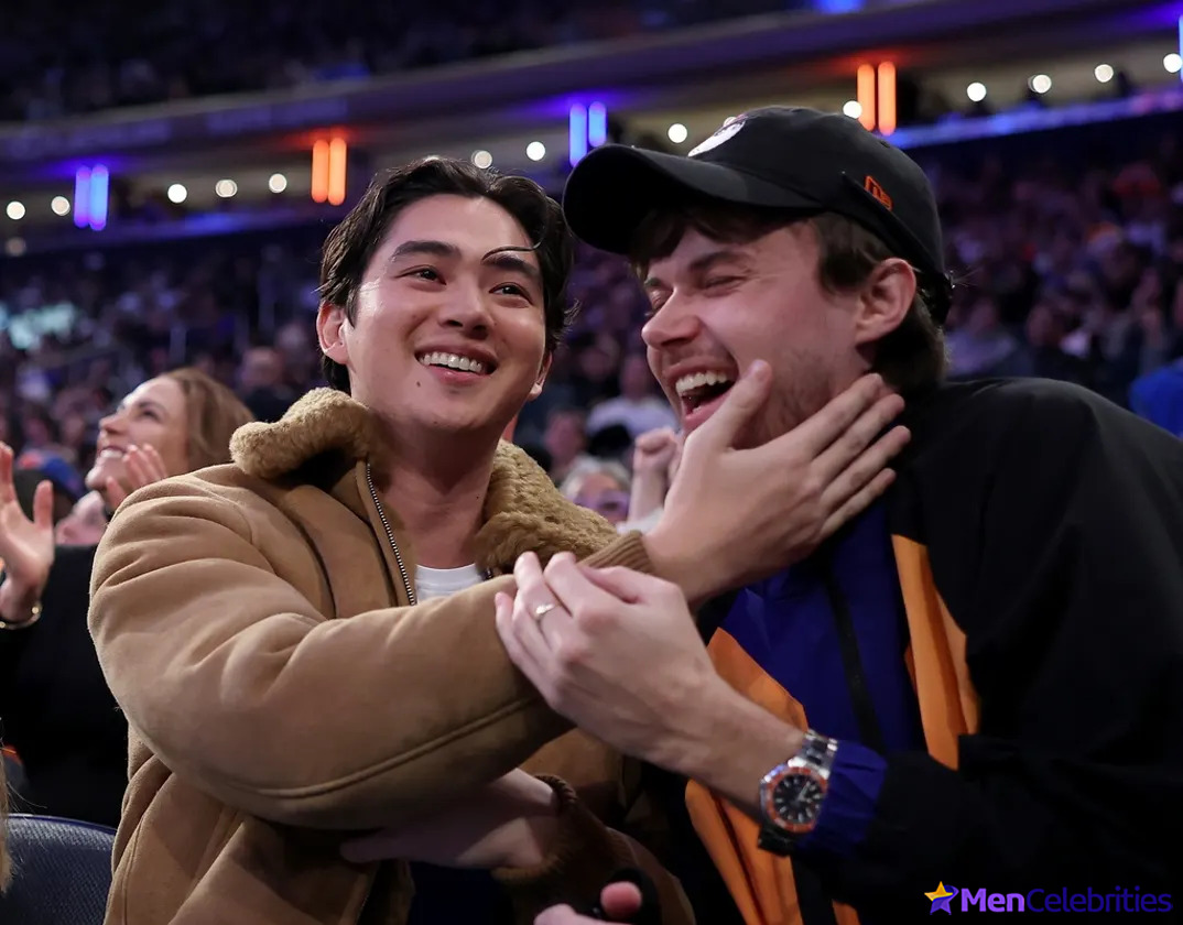 Sean Kaufman and Christopher Briney kiss