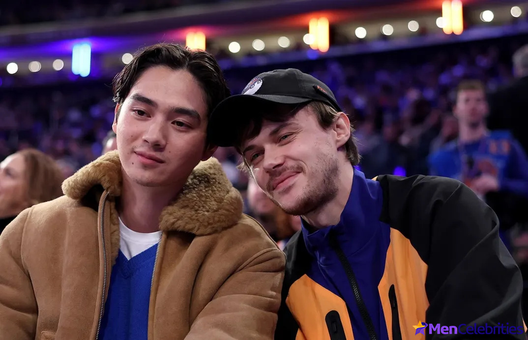 Sean Kaufman and Christopher Briney kiss