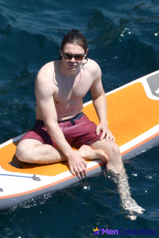 Evan Peters shirtless beach photos