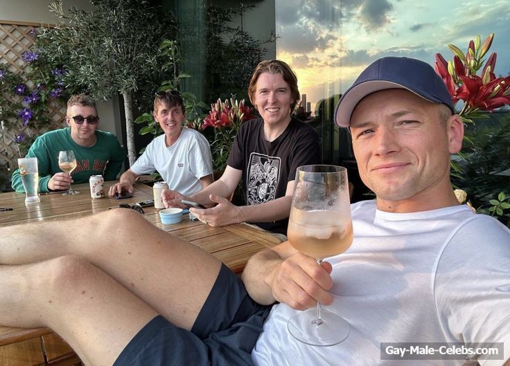 Taron Egerton shirtless beach pics