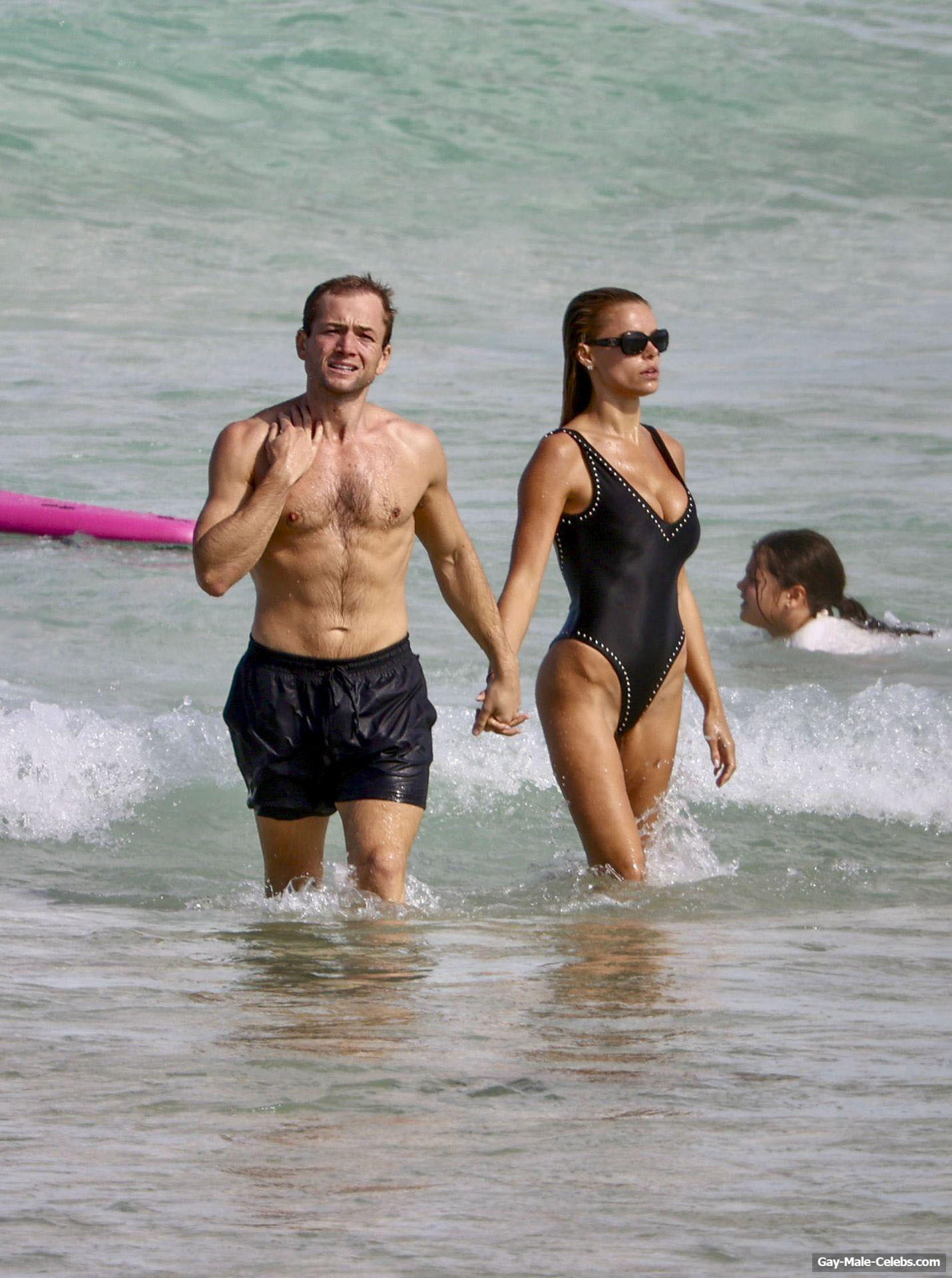 Taron Egerton shirtless beach pics