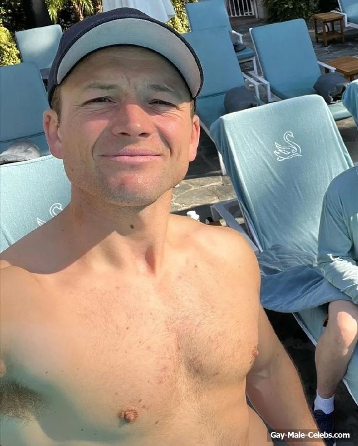 Taron Egerton shirtless beach pics