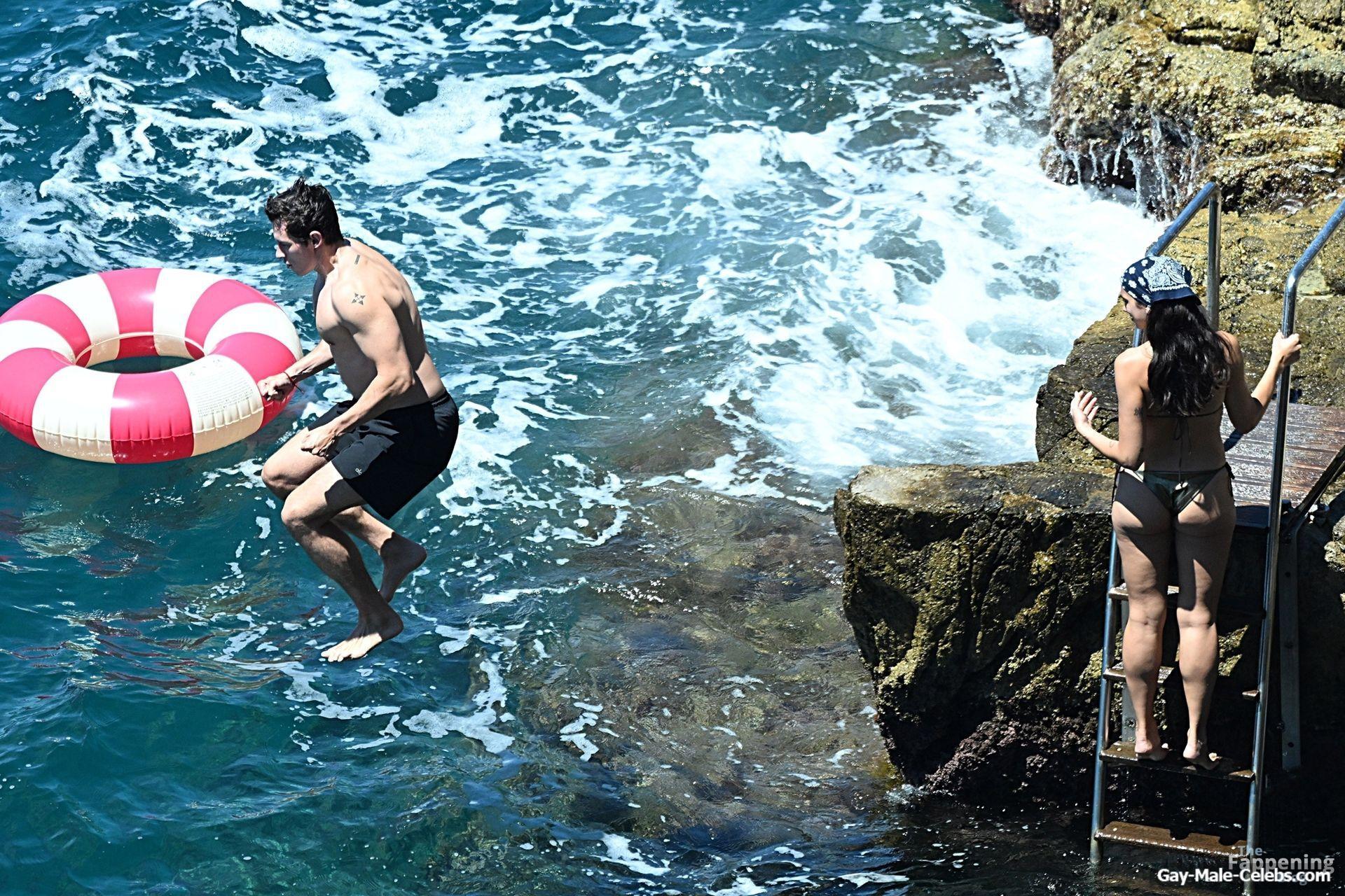 Callum Turner shirtless beach pics