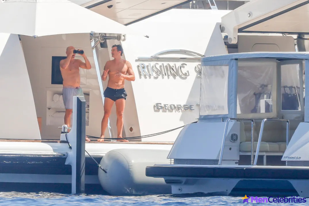 Orlando Blooms Shirtless Yacht Day with Woody Harrelson